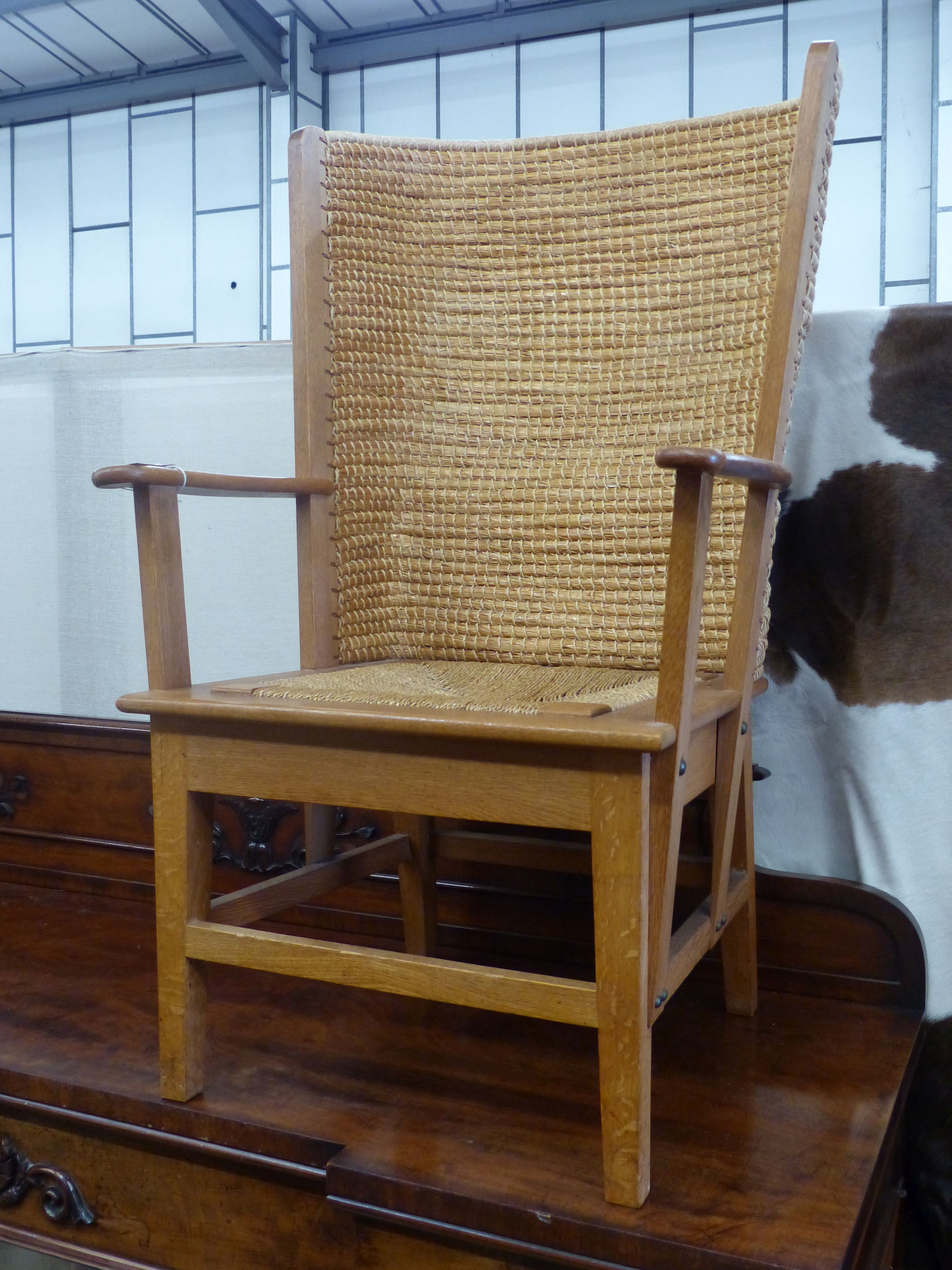 A 20th century light oak and skep work Orkney chair in traditional style, width 63cm, depth 60cm, height 106cm